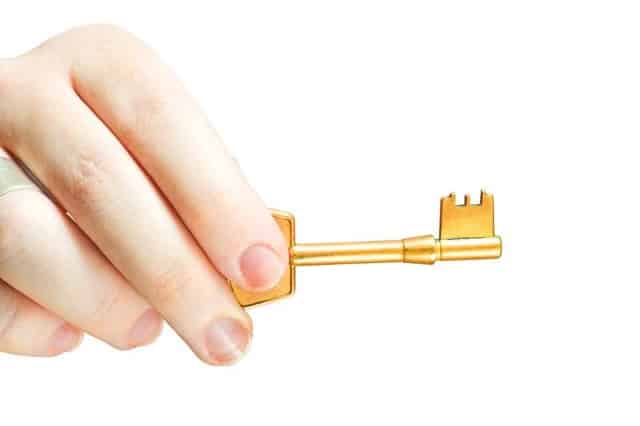 hand with key of motivation